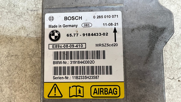 BMW E9X Airbag Module 9184433 *NEEDS TO BE RESET*