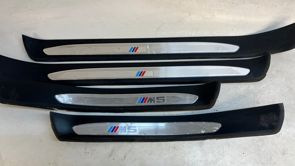 BMW E60 M5 M Sport Door Sill Trim Set 51477898819 / 51477898821 *DAMAGED*