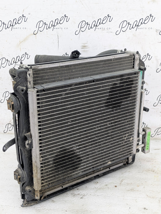 Porsche 996.2 911 Carrera 4 Right/Passenger Side Radiator AC Condenser Cooling Fan Shroud 99610613251/99662403502/99610603461/99657311100