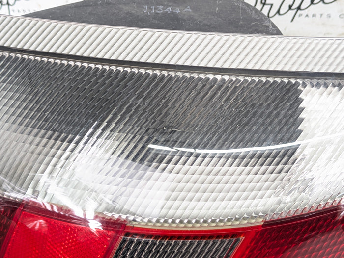 Porsche 996.2 911 Carrera 4 Rear Right/Passenger Side Tail Light 99663145600 *DAMAGED*