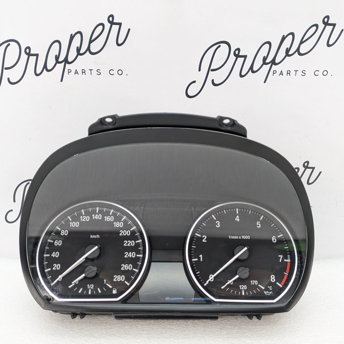 BMW E82 E88 135i Gauge Instrument Cluster KPH 9242329 *NOTE*