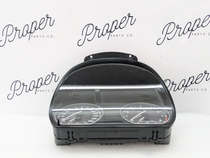 BMW E82 E88 135i Gauge Instrument Cluster KPH 9242329 *NOTE*