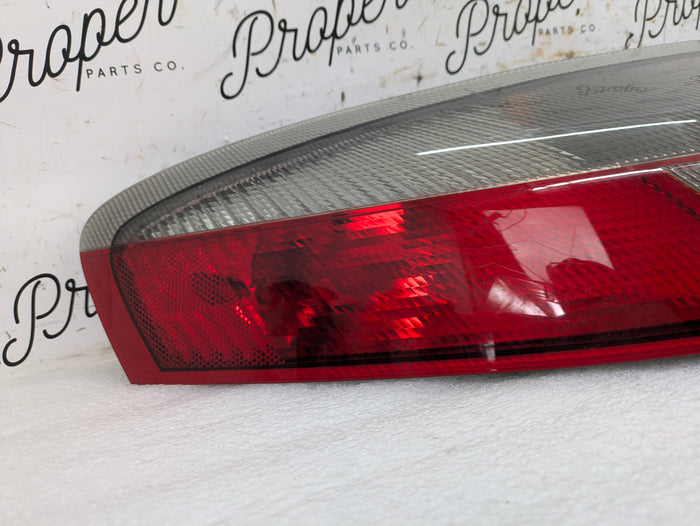 Porsche 996.2 911 Carrera 4 Rear Left/Driver Side Tail Light 99663149502 *DAMAGED*
