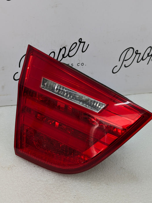 BMW E90 335xi 325xi 328xi 323i LCI Left/Driver Side Rear Inner Trunk Tail Light 7289427